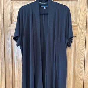 Short  sleeve long black sweater. Perfect for dressing up or down!